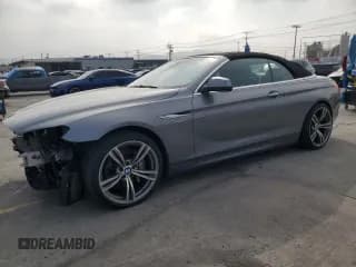 ✅ 2012 BMW 6 Series 650i • VIN: WBALZ3C57CDL71694 • Lot: 64867045. Wystawiony na Copart z przebiegiem 118 323 mil. Bezpłatny archiwum sprzedaży aukcyjnych z USA i szczegółowy raport historii pojazdu na DreamBid. Zdjęcie 1.