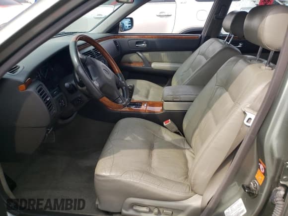 ✅ 2001 Infiniti Q45 Touring • VIN: JNKBY31A41M100833 • Lot: 64863674. Listed on Copart with Not provided. Free auction sales archive from the USA and detailed vehicle history report at DreamBid. Image 7.