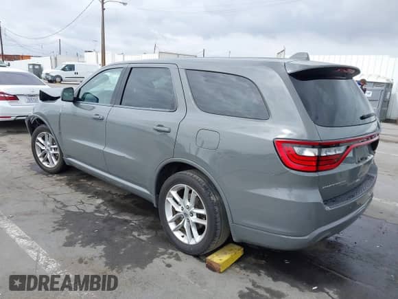 2021 Dodge Durango GT with VIN 1C4RDHDG1MC659811, listed as a IAAI auction lot 43260177 with 83,370 mi miles and . Bid and sale history available at DreamBid. Image 3.