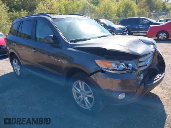 2012 Hyundai Santa Fe Limited with VIN 5XYZKDAG9CG120382, listed as a IAAI auction lot 43416587 with 205,312 mi miles and . Bid and sale history available at DreamBid. Image 1.