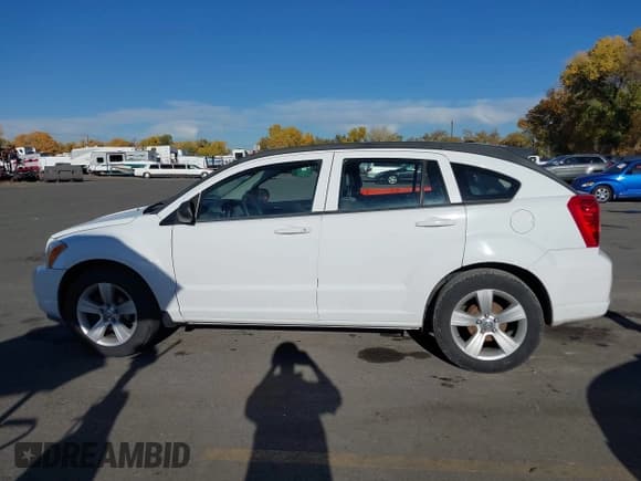 ✅ 2011 Dodge Caliber Mainstreet • VIN: 1B3CB3HA3BD209297 • Лот: 43572244. Опубликован ранее на IAAI с пробегом 111 079 миль. Бесплатный доступ к архиву аукционных продаж из США и подробный отчёт об истории автомобиля на DreamBid. Изображение 14.