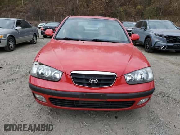 2002 Hyundai Elantra GT z VIN KMHDN55D62U069956, wystawiony jako Copart lot #78931504 z przebiegiem 52 117 mil mil oraz Czysty tytuł • Clean title. Historia ofert i sprzedaży dostępna na DreamBid. Obrazek 5.