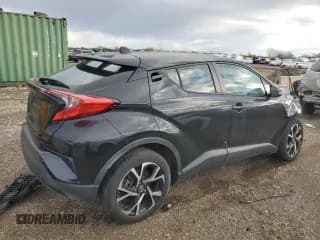 ✅ 2018 Toyota C-HR XLE • VIN: NMTKHMBX2JR001943 • Лот: 82625195. Опубликован ранее на Copart с пробегом 89 564 миль. Бесплатный доступ к архиву аукционных продаж из США и подробный отчёт об истории автомобиля на DreamBid. Изображение 3.