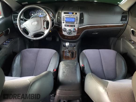 ✅ 2012 Hyundai Santa Fe SE • VIN: 5XYZHDAG9CG108036 • Lot: 75458614. Listed on Copart with 63,718 mi. Free auction sales archive from the USA and detailed vehicle history report at DreamBid. Image 8.