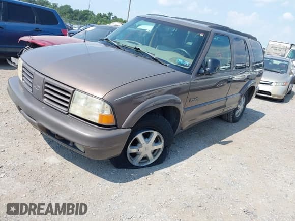 ✅ 1998 Oldsmobile Bravada • VIN: 1GHDT13WXW2702252 • Lot: 42861041. Listed on IAAI with 127,784 mi. Free auction sales archive from the USA and detailed vehicle history report at DreamBid. Image 17.