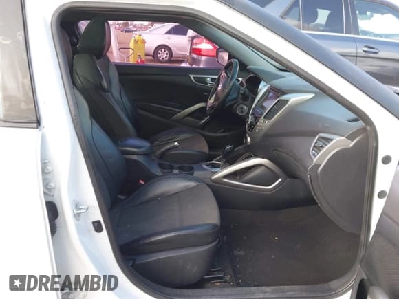 ✅ 2013 Hyundai Veloster w/Black Int • VIN: KMHTC6AD4DU162653 • Lot: 43849738. Wystawiony na IAAI z przebiegiem 178 593 mil. Bezpłatny archiwum sprzedaży aukcyjnych z USA i szczegółowy raport historii pojazdu na DreamBid. Zdjęcie 5.