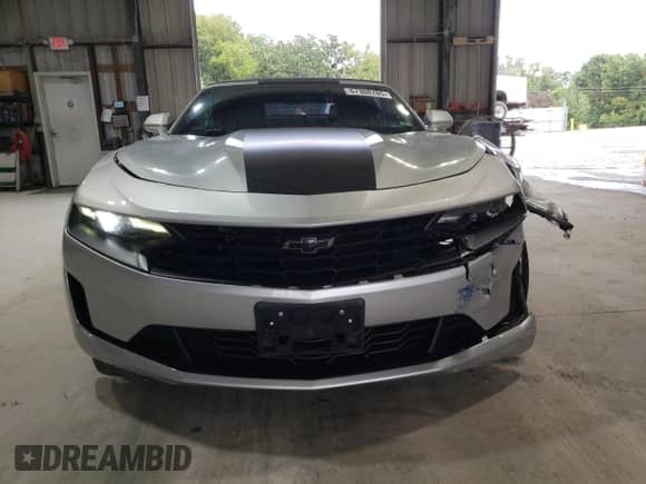 2019 Chevrolet Camaro 1LT с VIN 1G1FB3DX6K0112911, выставлен на аукционе Copart как лот 67308785 с пробегом 83 238 миль миль и Списание • Salvage title. История ставок и продаж доступна на DreamBid. Изображение 5.