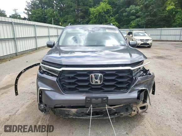 ✅ 2023 Honda Pilot EX-L • VIN: 5FNYG2H47PB007511 • Lot: 59969865. Listed on Copart with 36,616 mi. Free auction sales archive from the USA and detailed vehicle history report at DreamBid. Image 5.