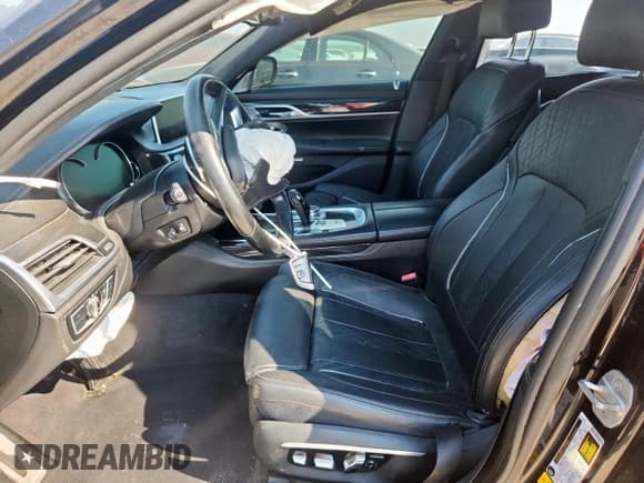 ✅ 2016 BMW 7 Series 750i • VIN: WBA7F0C53GGL99358 • Lot: 80313835. Listed on Copart with 87,729 mi. Free auction sales archive from the USA and detailed vehicle history report at DreamBid. Image 7.