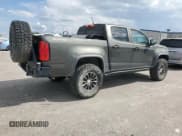 ✅ 2017 Chevrolet Colorado 4WD ZR2 • VIN: 1GCGTEEN0H1311246 • Лот: 72078584. Опубликован ранее на Copart с пробегом 119 678 миль. Бесплатный доступ к архиву аукционных продаж из США и подробный отчёт об истории автомобиля на DreamBid. Изображение 3.