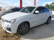 ✅ 2016 BMW X4 xDrive28i • VIN: 5UXXW3C58G0R18691 • Lot: 43922366. Listed on IAAI with 102,409 mi. Free auction sales archive from the USA and detailed vehicle history report at DreamBid. Image 2.