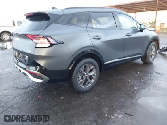 ✅ 2023 Kia Sportage SX-Prestige • VIN: KNDPXCAG9P7055572 • Лот: 43586302. Опубликован ранее на IAAI с пробегом 21 700 миль. Бесплатный доступ к архиву аукционных продаж из США и подробный отчёт об истории автомобиля на DreamBid. Изображение 4.