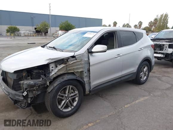 ✅ 2018 Hyundai Santa Fe 2.4L • VIN: 5XYZT3LB6JG571999 • Lot: 43406406. Wystawiony na IAAI z przebiegiem 104 647 mil. Bezpłatny archiwum sprzedaży aukcyjnych z USA i szczegółowy raport historii pojazdu na DreamBid. Zdjęcie 2.