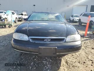 ✅ 1996 Chevrolet Monte Carlo LS • VIN: 2G1WW12MXT9160579 • Лот: 78601644. Опубликован ранее на Copart с пробегом 128 550 миль. Бесплатный доступ к архиву аукционных продаж из США и подробный отчёт об истории автомобиля на DreamBid. Изображение 5.