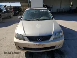✅ 2002 Mazda Protege DX • VIN: JM1BJ225621602392 • Lot: 80700724. Wystawiony na Copart z przebiegiem 351 584 mil. Bezpłatny archiwum sprzedaży aukcyjnych z USA i szczegółowy raport historii pojazdu na DreamBid. Zdjęcie 5.