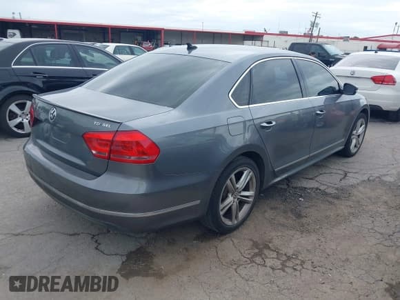 ✅ 2014 Volkswagen Passat SEL Premium • VIN: 1VWCN7A39EC070616 • Lot: 42668136. Listed on IAAI with 187,168 mi. Free auction sales archive from the USA and detailed vehicle history report at DreamBid. Image 4.