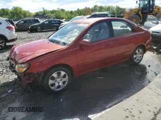 ✅ 2009 Kia Spectra LX • VIN: KNAFE222795645649 • Lot: 57354385. Listed on Copart with 104,378 mi. Free auction sales archive from the USA and detailed vehicle history report at DreamBid. Image 1.