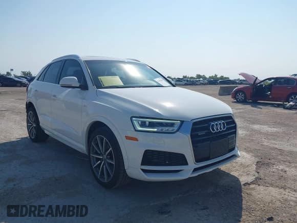 ✅ 2018 Audi Q3 Premium Plus • VIN: WA1JCCFS5JR026980 • Лот: 43168665. Опубликован ранее на IAAI с пробегом 86 255 миль. Бесплатный доступ к архиву аукционных продаж из США и подробный отчёт об истории автомобиля на DreamBid. Изображение 1.