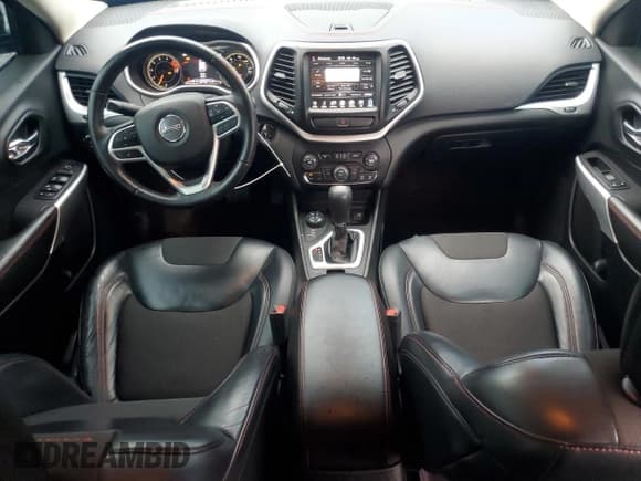 ✅ 2017 Jeep Cherokee Trailhawk • VIN: 1C4PJMBS1HW648716 • Lot: 57490635. Listed on Copart with 94,983 mi. Free auction sales archive from the USA and detailed vehicle history report at DreamBid. Image 8.