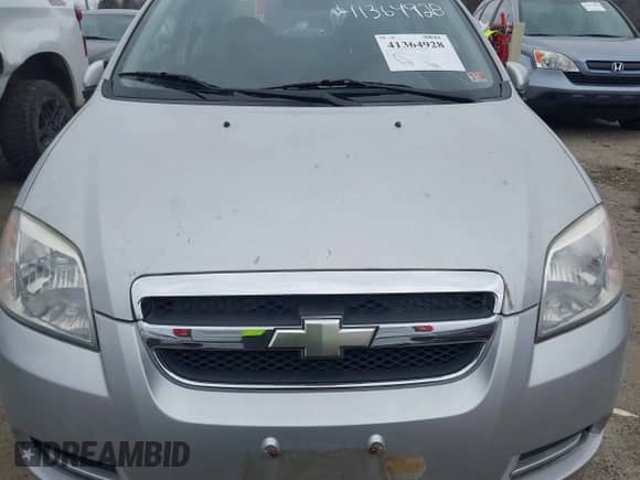 2008 Chevrolet Aveo LS z VIN KL1TD566X8B151512, wystawiony jako IAAI lot #41364928 z przebiegiem 67 477 mil mil oraz . Historia ofert i sprzedaży dostępna na DreamBid. Obrazek 6.