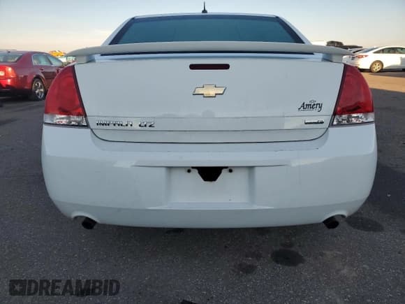 ✅ 2014 Chevrolet Impala LTZ • VIN: 2G1WC5E39E1152302 • Lot: 86253965. Listed on Copart with 121,662 mi. Free auction sales archive from the USA and detailed vehicle history report at DreamBid. Image 6.