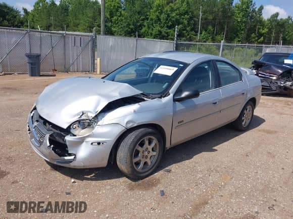 2005 Dodge Neon SXT z VIN 1B3ES56C35D142648, wystawiony jako IAAI lot #42599069 z przebiegiem 118 930 mil mil oraz . Historia ofert i sprzedaży dostępna na DreamBid. Obrazek 2.