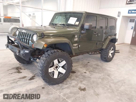 ✅ 2008 Jeep Wrangler Unlimited Sahara • VIN: 1J4GA59158L504309 • Lot: 43292936. Listed on IAAI with 147,545 mi. Free auction sales archive from the USA and detailed vehicle history report at DreamBid. Image 19.