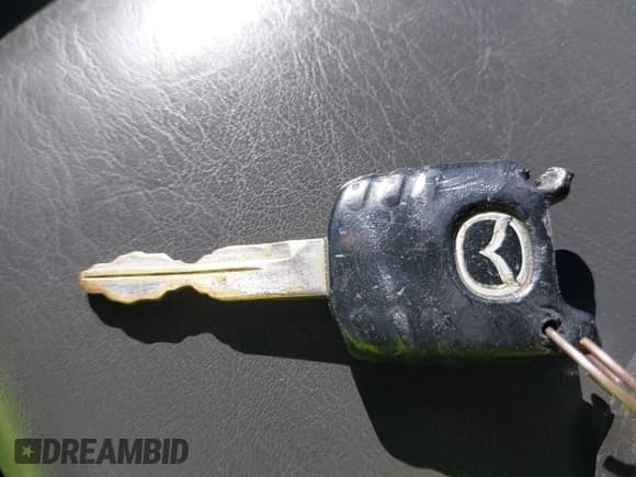 ✅ 2005 Mazda Tribute i • VIN: 4F2YZ02Z65KM48274 • Lot: 43129870. Listed on IAAI with 144,826 mi. Free auction sales archive from the USA and detailed vehicle history report at DreamBid. Image 11.