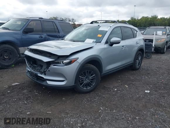 ✅ 2017 Mazda CX-5 Touring • VIN: JM3KFBCL6H0198854 • Lot: 43555680. Listed on IAAI with 130,367 mi. Free auction sales archive from the USA and detailed vehicle history report at DreamBid. Image 2.