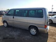 ✅ 2000 Volkswagen EuroVan • VIN: WV2MH4703YH013265 • Lot: 59003645. Listed on Copart with Not provided. Free auction sales archive from the USA and detailed vehicle history report at DreamBid. Image 2.
