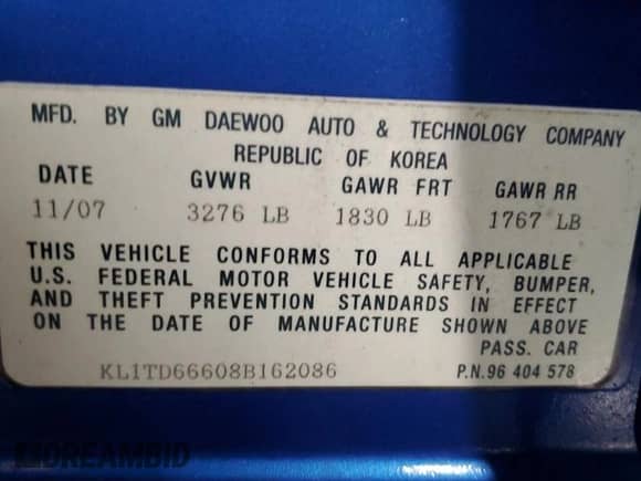 2008 Chevrolet Aveo LS z VIN KL1TD66608B162086, wystawiony jako Copart lot #87355244 z przebiegiem 115 649 mil mil oraz Szkoda całkowita • Salvage title. Historia ofert i sprzedaży dostępna na DreamBid. Obrazek 13.