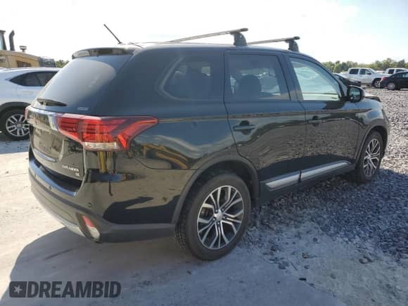 2016 Mitsubishi Outlander SE с VIN JA4AZ3A37GZ001263, выставлен на аукционе Copart как лот 82268645 с пробегом 56 308 миль миль и Списание • Salvage title. История ставок и продаж доступна на DreamBid. Изображение 3.