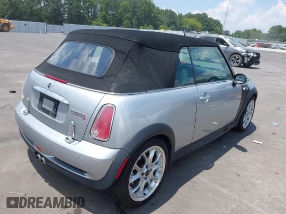 ✅ 2007 MINI Convertible S • VIN: WMWRH33597TJ43981 • Lot: 42626239. Listed on IAAI with 78,629 mi. Free auction sales archive from the USA and detailed vehicle history report at DreamBid. Image 4.