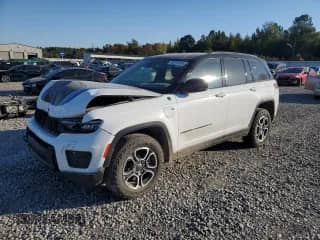 2022 Jeep Grand Cherokee Trailhawk with VIN 1C4RJYC63N8747507, listed as a Copart auction lot 76771914 with 18,057 mi miles and Salvage title. Bid and sale history available at DreamBid. Image 1.