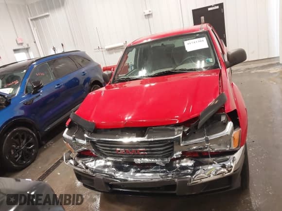 ✅ 2007 GMC Canyon • VIN: 1GTDS199378223096 • Lot: 41743304. Listed on IAAI with 97,940 mi. Free auction sales archive from the USA and detailed vehicle history report at DreamBid. Image 12.