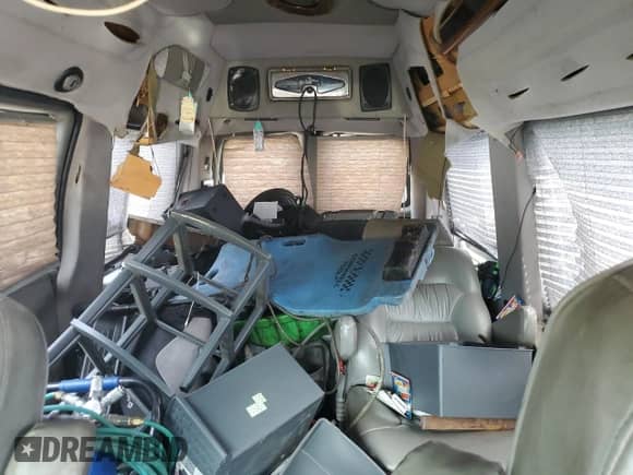 2003 Chevrolet Express Passenger with VIN 1GBFG15X431233061, listed as a Copart auction lot 62646375 with Not provided miles and Salvage title. Bid and sale history available at DreamBid. Image 10.