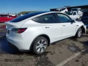 ✅ 2022 Tesla Model Y Long Range • VIN: 7SAYGDEE1NF402745 • Lot: 41493850. Wystawiony na IAAI z przebiegiem 11 222 mil. Bezpłatny archiwum sprzedaży aukcyjnych z USA i szczegółowy raport historii pojazdu na DreamBid. Zdjęcie 4.