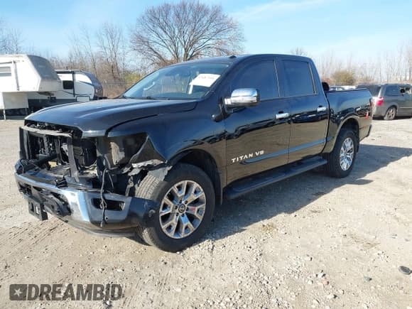 ✅ 2020 Nissan Titan Pro-4X • VIN: 1N6AA1ED1LN512132 • Lot: 43687444. Listed on IAAI with 57,880 mi. Free auction sales archive from the USA and detailed vehicle history report at DreamBid. Image 2.