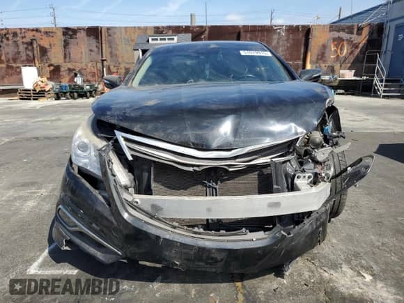 2015 Hyundai Azera Limited z VIN KMHFH4JG1FA453211, wystawiony jako Copart lot #51019915 z przebiegiem 122 712 mil mil oraz Szkoda całkowita • Salvage title. Historia ofert i sprzedaży dostępna na DreamBid. Obrazek 5.