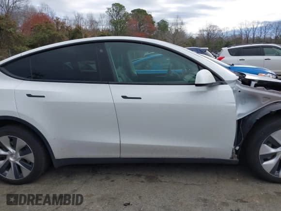 ✅ 2023 Tesla Model Y Long Range • VIN: 7SAYGDEE4PF621640 • Lot: 41796502. Listed on IAAI with 68,484 mi. Free auction sales archive from the USA and detailed vehicle history report at DreamBid. Image 14.