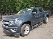 ✅ 2019 Chevrolet Colorado 2WD LT • VIN: 1GCGSCEN0K1206804 • Лот: 43296788. Опубликован ранее на IAAI с пробегом 74 724 миль. Бесплатный доступ к архиву аукционных продаж из США и подробный отчёт об истории автомобиля на DreamBid. Изображение 2.
