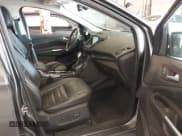 ✅ 2015 Ford Escape Titanium • VIN: 1FMCU9J98FUC05727 • Lot: 42229328. Listed on IAAI with 112,896 mi. Free auction sales archive from the USA and detailed vehicle history report at DreamBid. Image 5.