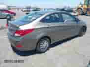 2014 Hyundai Accent GLS with VIN KMHCT4AE8EU655136, listed as a IAAI auction lot 42797016 with 102,554 mi miles and . Bid and sale history available at DreamBid. Image 4.