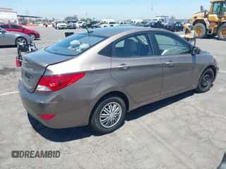 2014 Hyundai Accent GLS with VIN KMHCT4AE8EU655136, listed as a IAAI auction lot 42797016 with 102,554 mi miles and . Bid and sale history available at DreamBid. Image 4.