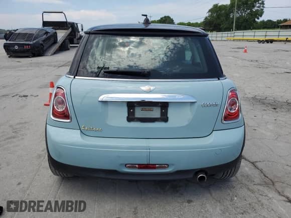 2013 MINI Hardtop z VIN WMWSU3C58DT680091, wystawiony jako Copart lot #60896275 z przebiegiem 136 767 mil mil oraz Czysty tytuł • Clean title. Historia ofert i sprzedaży dostępna na DreamBid. Obrazek 6.