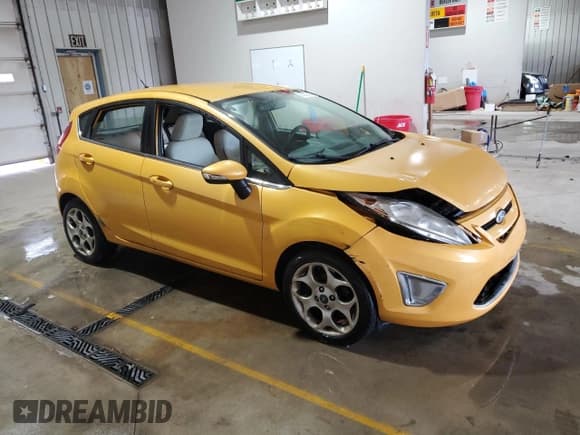 ✅ 2011 Ford Fiesta SES • VIN: 3FADP4FJ8BM124348 • Lot: 90252535. Wystawiony na Copart z przebiegiem 111 429 mil. Bezpłatny archiwum sprzedaży aukcyjnych z USA i szczegółowy raport historii pojazdu na DreamBid. Zdjęcie 4.