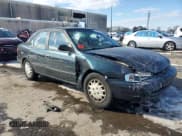 ✅ 1998 Chevrolet Prizm Lsi • VIN: 1Y1SK5289WZ410167 • Lot: 86793174. Listed on Copart with Not provided. Free auction sales archive from the USA and detailed vehicle history report at DreamBid. Image 4.