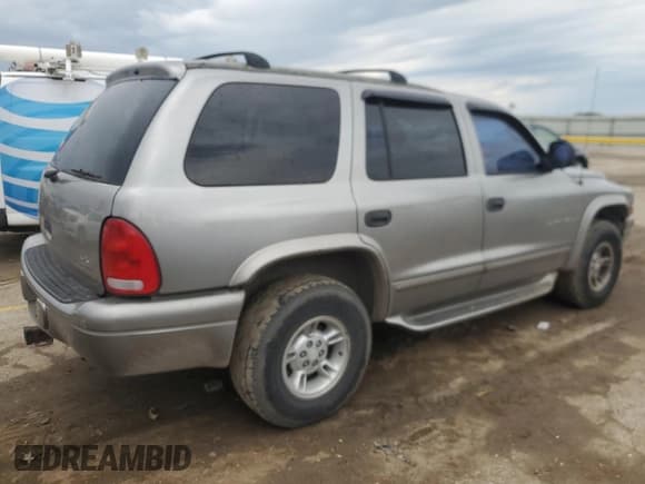 ✅ 1999 Dodge Durango • VIN: 1B4HS28Y1XF627197 • Lot: 81137955. Listed on Copart with 235,339 mi. Free auction sales archive from the USA and detailed vehicle history report at DreamBid. Image 3.