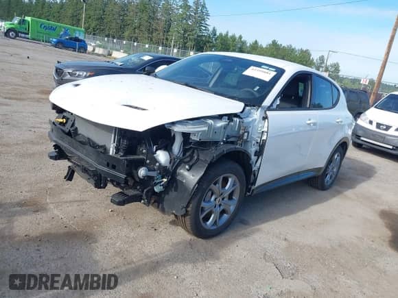 2024 Dodge Hornet R/T z VIN ZACPDFCWXR3A33544, wystawiony jako IAAI lot #42399881 z przebiegiem 2 027 mil mil oraz . Historia ofert i sprzedaży dostępna na DreamBid. Obrazek 2.