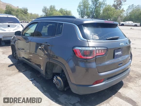 ✅ 2020 Jeep Compass Latitude • VIN: 3C4NJCBB9LT169802 • Lot: 42520373. Listed on IAAI with 107,704 mi. Free auction sales archive from the USA and detailed vehicle history report at DreamBid. Image 3.